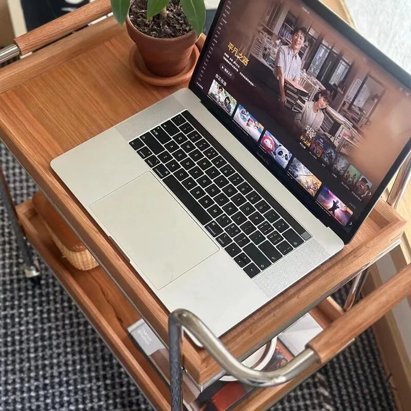 Belmont Collection | Geometric Atomic-Era Solid Walnut Rolling Tea Cart - highlighting material texture and craftsmanship detail in a Mid-Century Modern living room setting.