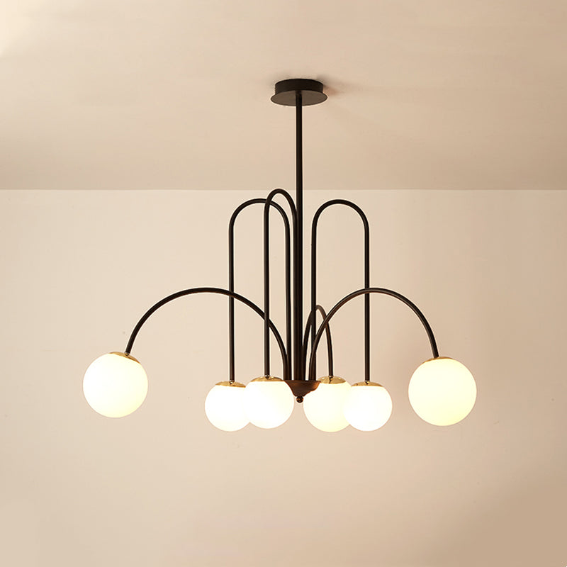 Belmont Collection | Sculptural Brass-Accented Brass Pendant Lamp - styled from an alternate angle revealing dimensional depth in a Mid-Century Modern living room setting.