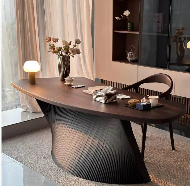 Astoria Collection | Tapered-Leg Oval Walnut Oval Coffee Table - styled from an alternate angle revealing dimensional depth in a Mid-Century Modern living room setting.