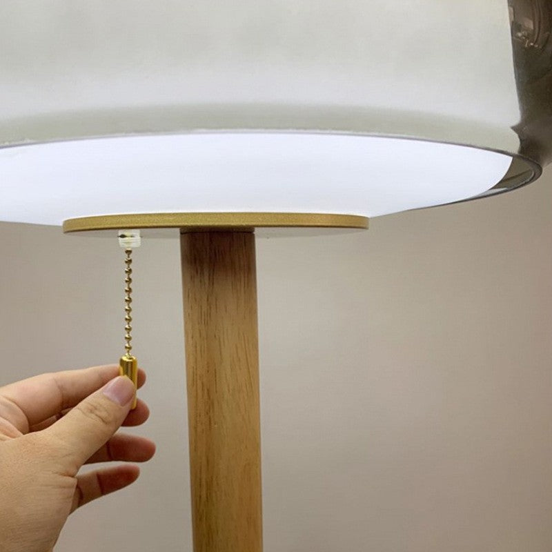 Ellington Collection | Geometric Brass-Accented Walnut Accent Lamp - captured in a curated lifestyle vignette in a Mid-Century Modern living room setting.