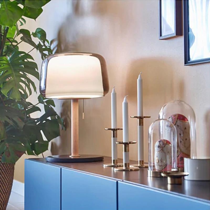 Ellington Collection | Geometric Brass-Accented Walnut Accent Lamp - styled from an alternate angle revealing dimensional depth in a Mid-Century Modern living room setting.