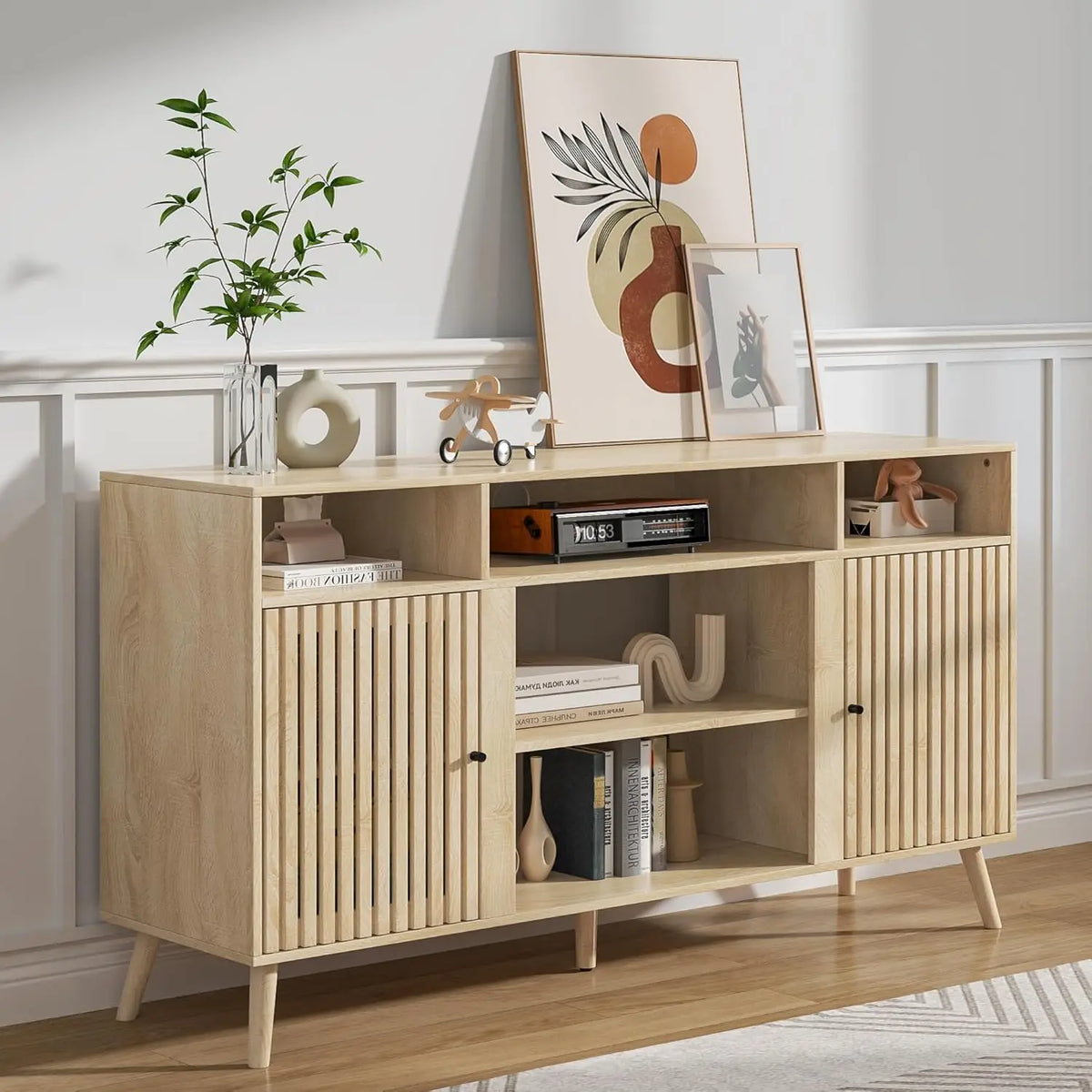 Dresden Collection | Fluted California Fluted Walnut Media Console - styled from an alternate angle revealing dimensional depth in a Mid-Century Modern entryway setting.