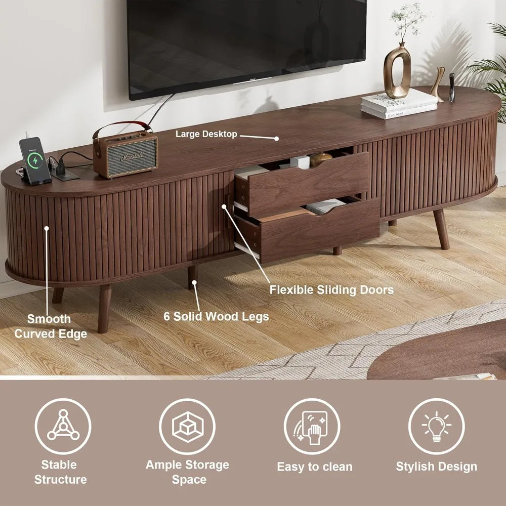 Ellington Collection | Floating Curved Curved Walnut Console - revealing tonal warmth and surface patina under ambient light in a Mid-Century Modern entryway setting.