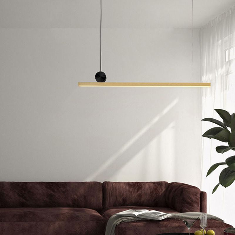 Ellington Collection | Geometric Copper-Kissed Brushed Copper Chandelier - captured in a curated lifestyle vignette in a Mid-Century Modern living room setting.