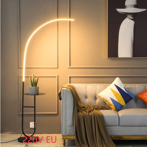Ellington Collection | Sculptural Glass-Topped Walnut & Brass LED Bedside Lamp - presented at scale within a designed interior in a Mid-Century Modern bedroom setting.