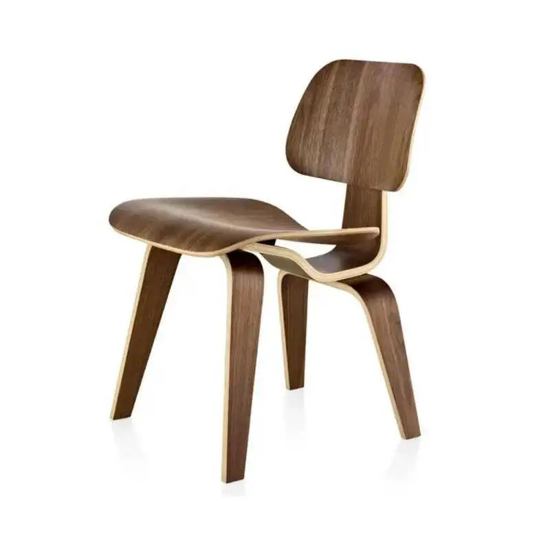 Fontaine Collection | Curved Molded Plywood Dining Chair - highlighting material texture and craftsmanship detail in a Mid-Century Modern dining room setting.