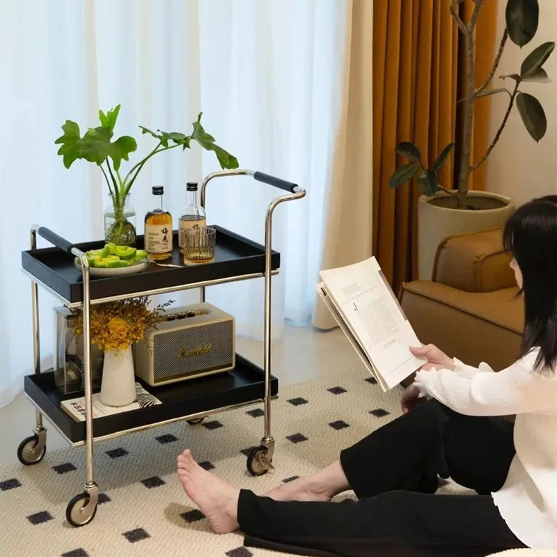 Belmont Collection | Geometric Atomic-Era Solid Walnut Rolling Tea Cart - captured in a curated lifestyle vignette in a Mid-Century Modern living room setting.