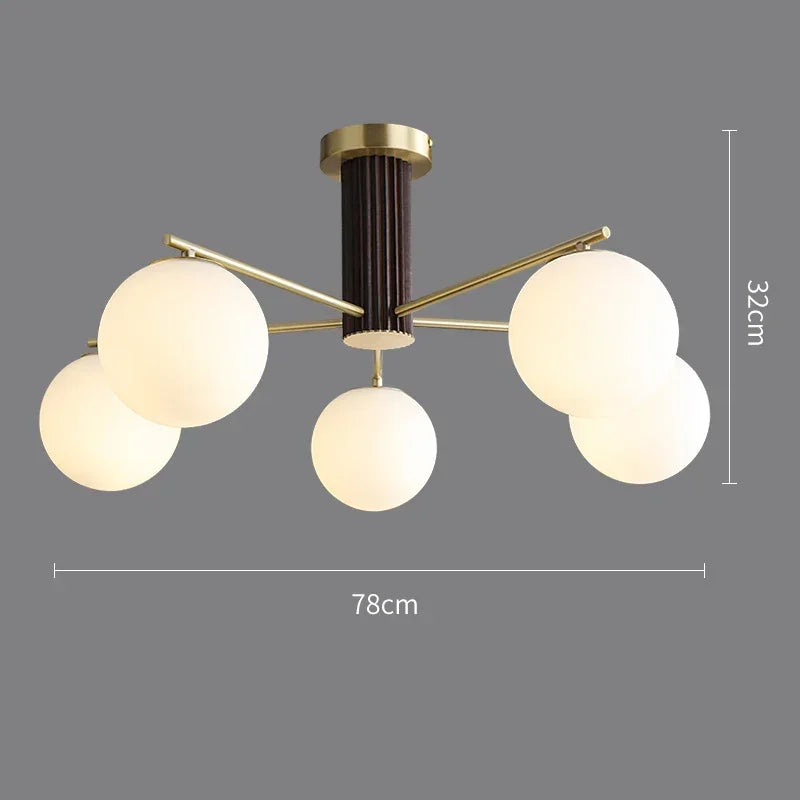 Fontaine Collection | Sculptural Glass-Topped Rose Glass Sphere Chandelier - detail view 17 revealing design nuance in a Mid-Century Modern living room setting.