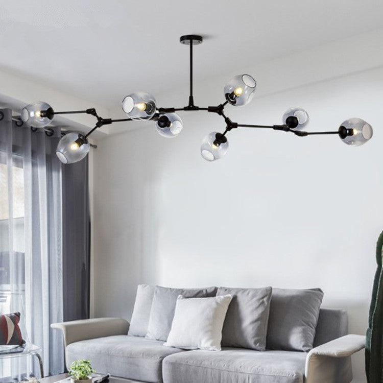 Fontaine Collection | Sculptural Atomic-Era Branch Chandelier - showcasing full sculptural form and curated finish in a Mid-Century Modern living room setting.