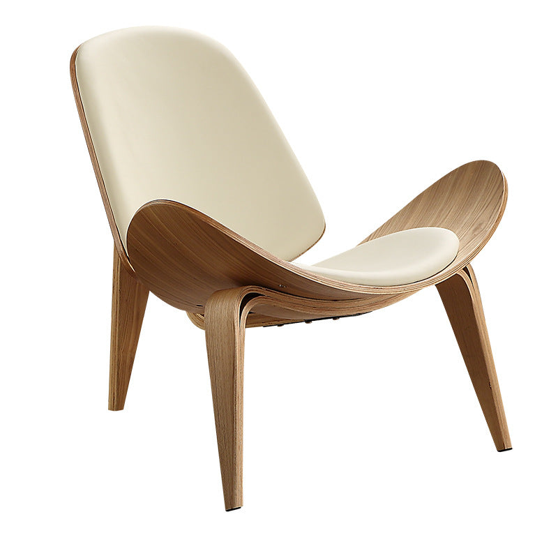 Ellington Collection | Sculptural Leather-Wrapped Walnut Leisure Chair - captured in a curated lifestyle vignette in a Mid-Century Modern living room setting.
