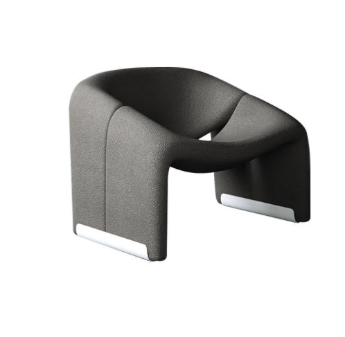 Ellington Collection | Sculptural Velvet-Cushioned Velvet Lounge Chair - framed in an editorial still-life composition in a Mid-Century Modern living room setting.
