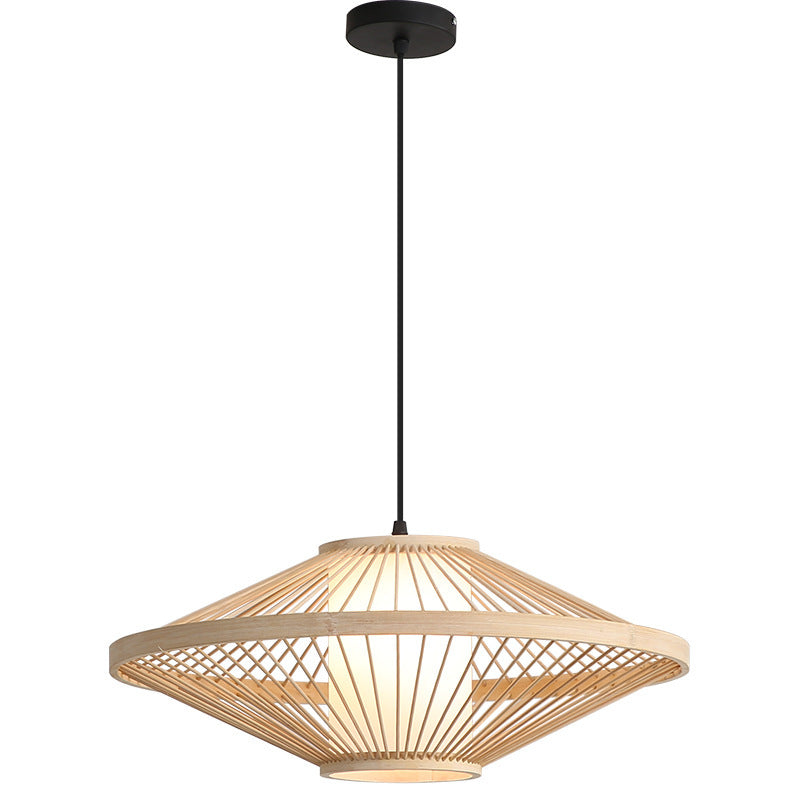 Havana Collection | Sculptural Brass-Accented Woven Rattan Chandelier - presented at scale within a designed interior in a Mid-Century Modern living room setting.