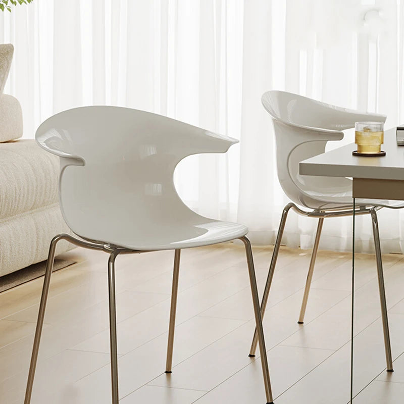 Dresden Collection | Sculptural Atomic-Era Walnut Dining Chairs - showcasing full sculptural form and curated finish in a Mid-Century Modern dining room setting.