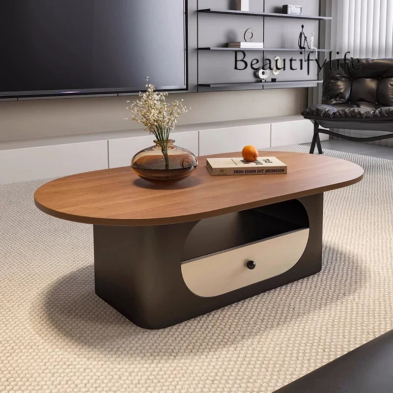 Belmont Collection | Floating Brass-Accented Walnut & Brass Oval Coffee Table - styled from an alternate angle revealing dimensional depth in a Mid-Century Modern living room setting.