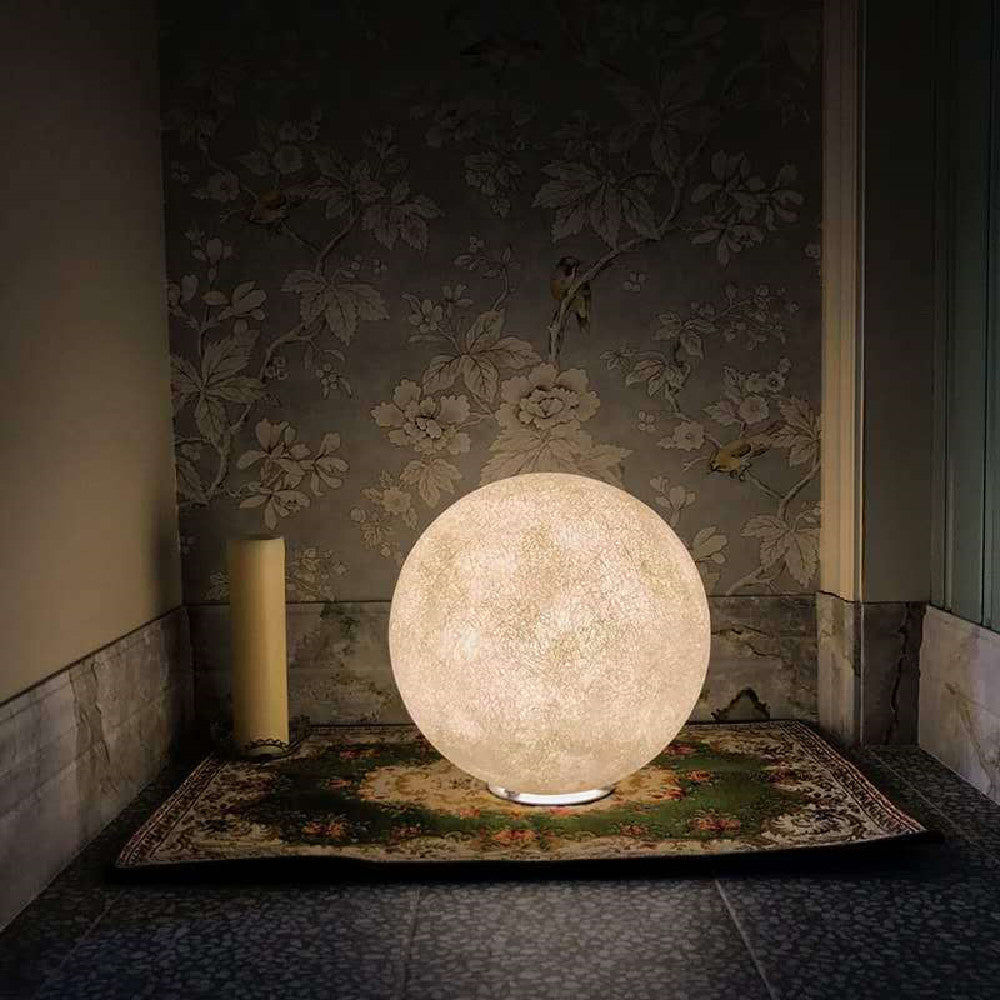 Astoria Collection | Minimalist Moon LED Floor Lamp - styled from an alternate angle revealing dimensional depth in a Mid-Century Modern living room setting.