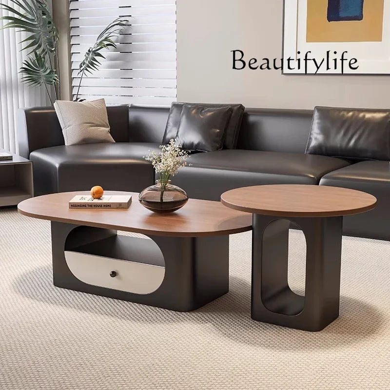 Belmont Collection | Floating Brass-Accented Walnut & Brass Oval Coffee Table - showcasing full sculptural form and curated finish in a Mid-Century Modern living room setting.