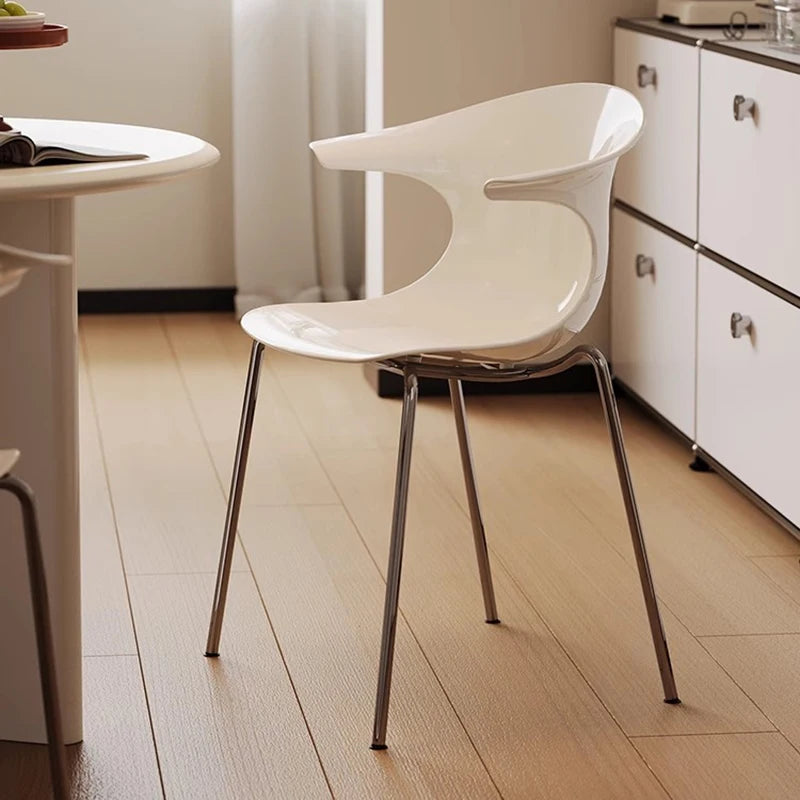 Dresden Collection | Sculptural Atomic-Era Walnut Dining Chairs - featuring close-up joinery and artisanal finish quality in a Mid-Century Modern dining room setting.