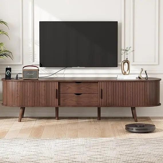 Ellington Collection | Floating Curved Curved Walnut Console - styled from an alternate angle revealing dimensional depth in a Mid-Century Modern entryway setting.
