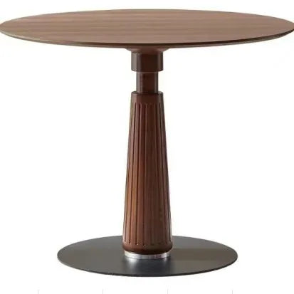Astoria Collection | Round Walnut & Brass Dining Table - revealing tonal warmth and surface patina under ambient light in a Mid-Century Modern dining room setting.