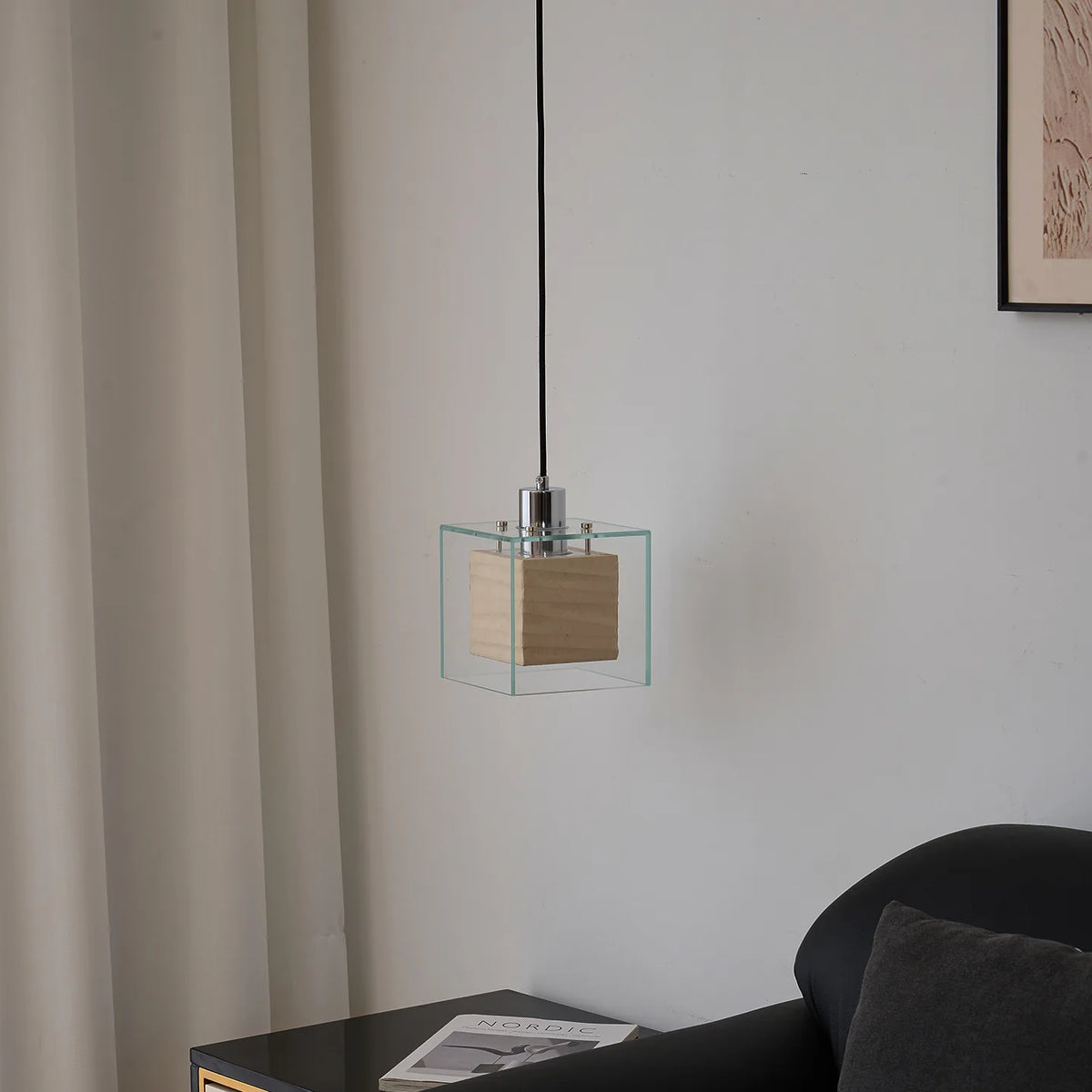 Ellington Collection | Geometric Atomic-Era Brass Pendant - styled from an alternate angle revealing dimensional depth in a Mid-Century Modern living room setting.