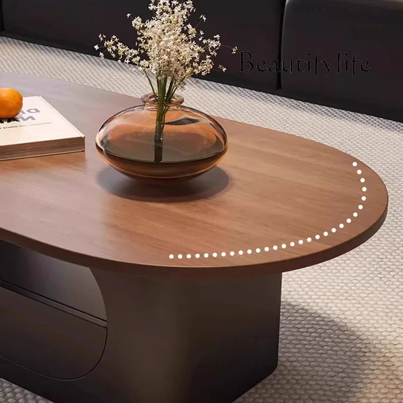 Belmont Collection | Floating Brass-Accented Walnut & Brass Oval Coffee Table - highlighting material texture and craftsmanship detail in a Mid-Century Modern living room setting.