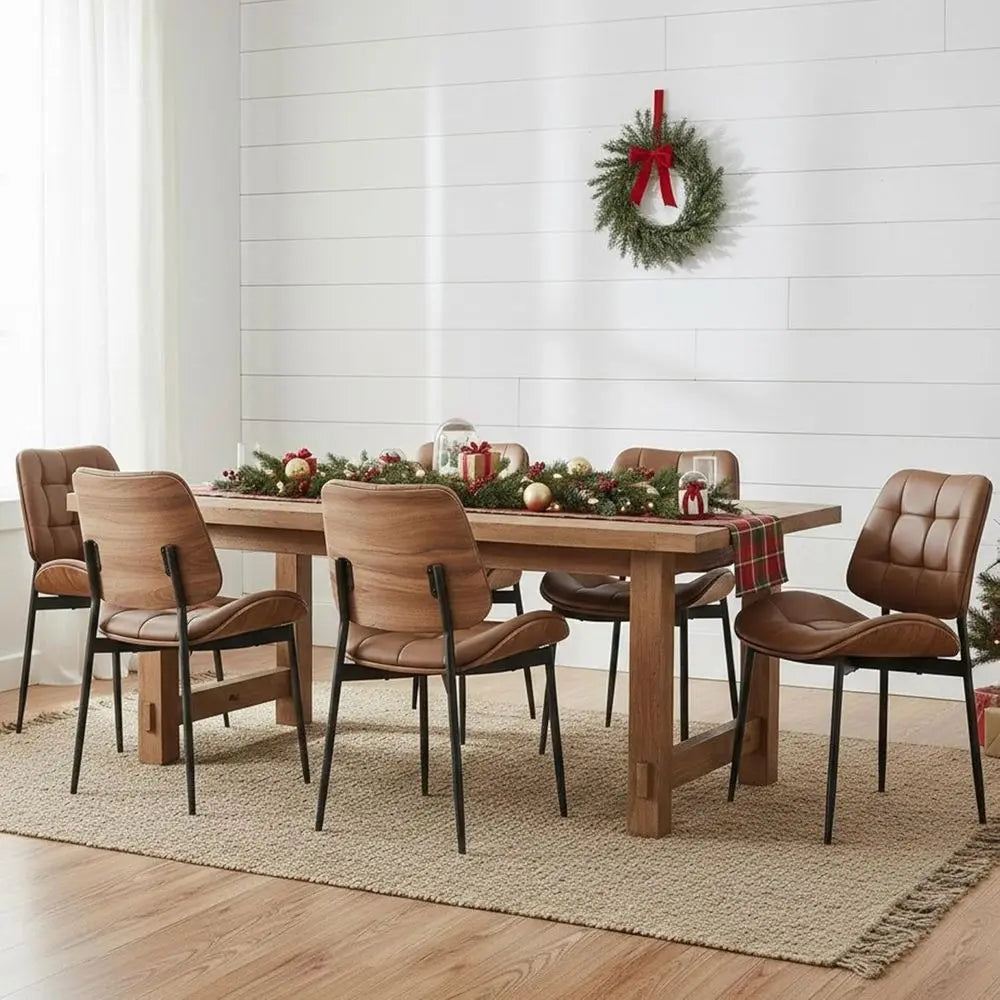 Fontaine Collection | Sculptural Chrome-Detailed Cognac Leather Dining Set - captured in a curated lifestyle vignette in a Mid-Century Modern dining room setting.