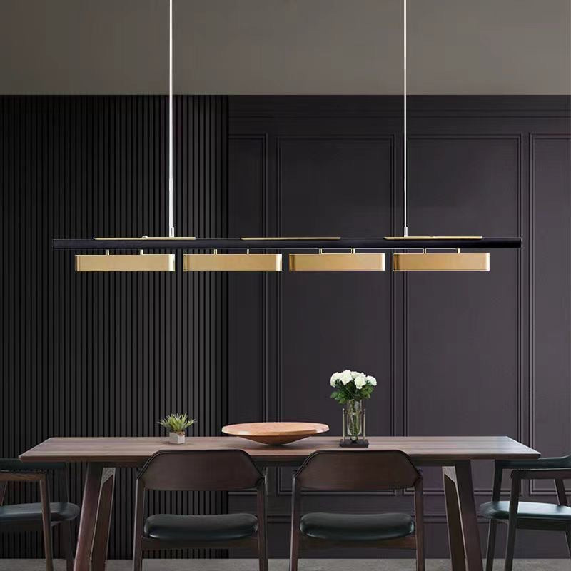 Kensington Collection | Geometric Rectangular Rectangular Pendant Light - showcasing full sculptural form and curated finish in a Mid-Century Modern living room setting.