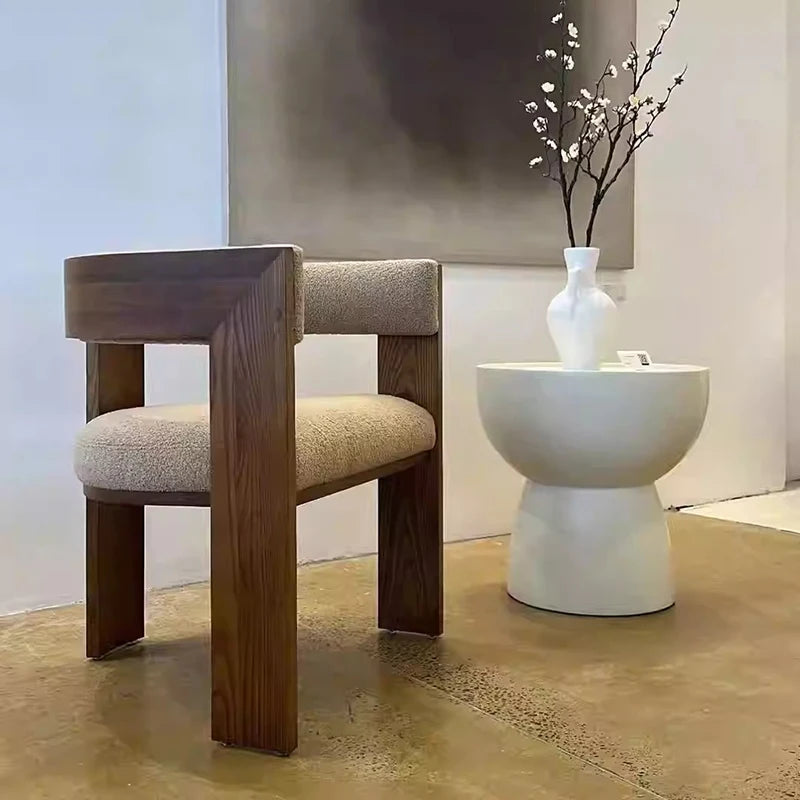 Ellington Collection | Sculptural Rattan-Woven Cane-Woven Dining Chairs - captured in a curated lifestyle vignette in a Mid-Century Modern dining room setting.