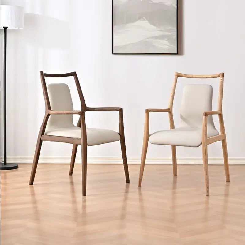 Ellington Collection | Floating Brass-Accented Walnut Armchair - highlighting material texture and craftsmanship detail in a Mid-Century Modern living room setting.