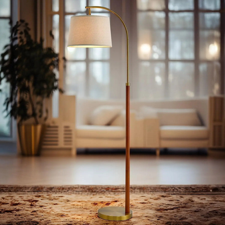 Fontaine Collection | Sculptural Marble-Topped Brushed Brass Arc - showcasing full sculptural form and curated finish in a Mid-Century Modern living room setting.