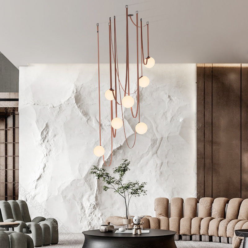 Dresden Collection | Floating Brass-Accented Brass & LED Chandelier - highlighting material texture and craftsmanship detail in a Mid-Century Modern living room setting.