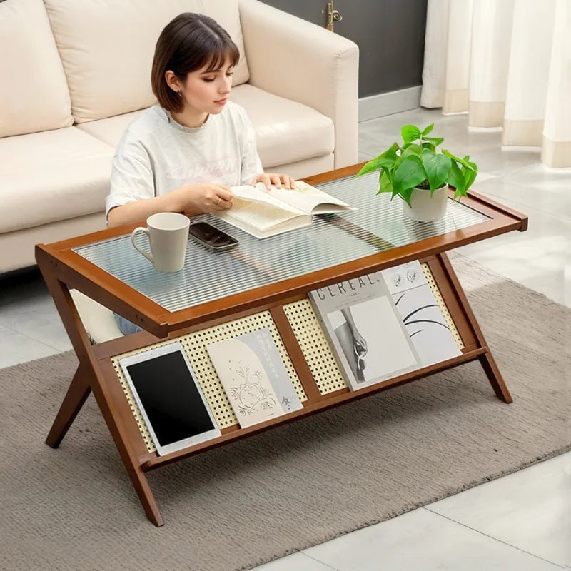 Belmont Collection | Sculptural Glass-Top Rattan & Glass Coffee Table - captured in a curated lifestyle vignette in a Mid-Century Modern living room setting.