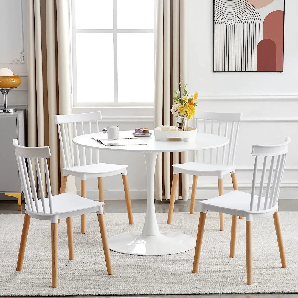 Dresden Collection | Sculptural Marble-Topped Carrara Marble Tulip Table - styled from an alternate angle revealing dimensional depth in a Mid-Century Modern living room setting.