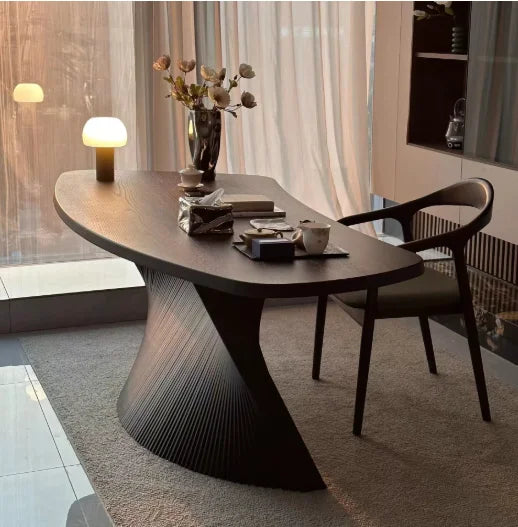 Astoria Collection | Tapered-Leg Oval Walnut Oval Coffee Table - showcasing full sculptural form and curated finish in a Mid-Century Modern living room setting.