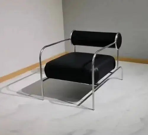 Fontaine Collection | Sculptural Atomic-Era Walnut Recliner - presented at scale within a designed interior in a Mid-Century Modern living room setting.