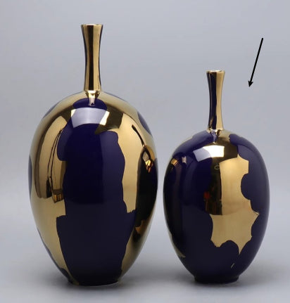Fontaine Collection | Sculptural Gold-Trimmed Ceramic & Gold Leaf Vase - presented at scale within a designed interior in a Mid-Century Modern living room setting.
