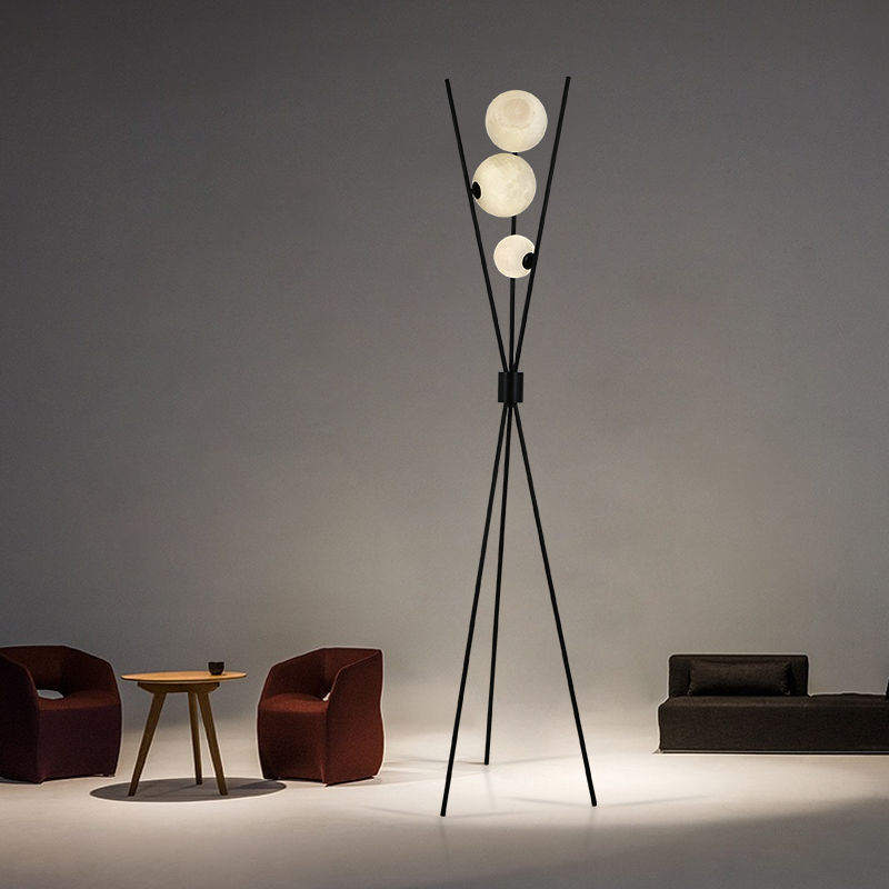 Ellington Collection | Geometric Atomic-Era Tri-Orb LED Floor Lamp - styled from an alternate angle revealing dimensional depth in a Mid-Century Modern living room setting.