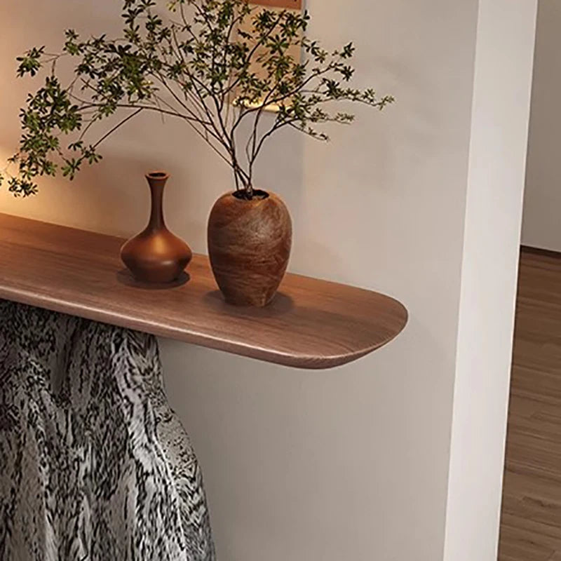 Dresden Collection | Desert-Modern Walnut Console - styled from an alternate angle revealing dimensional depth in a Mid-Century Modern entryway setting.