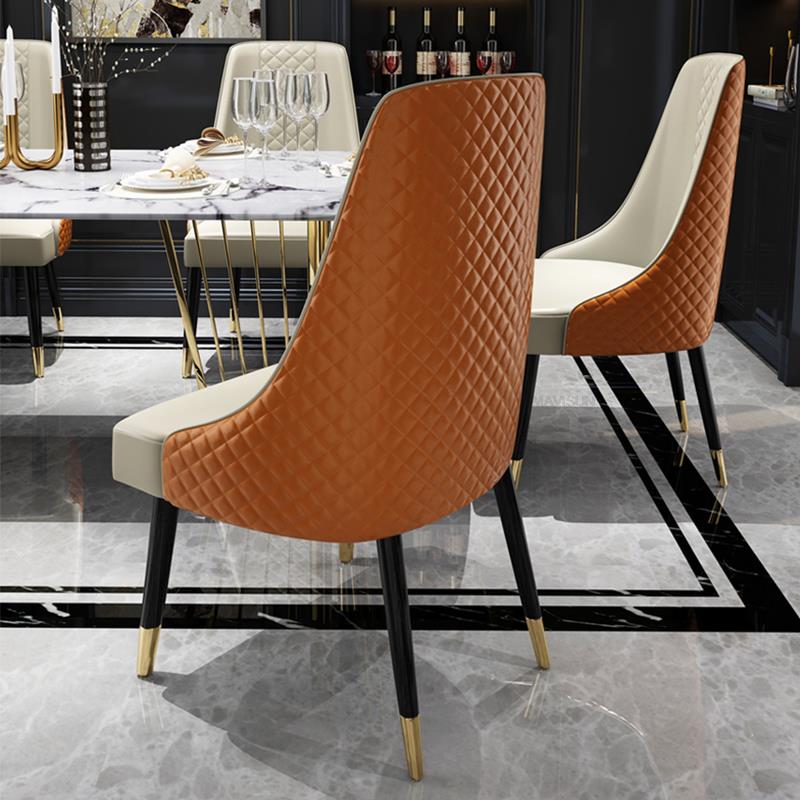 Fontaine Collection | Sculptural Leather-Wrapped Italian Leather Dining Chair - styled from an alternate angle revealing dimensional depth in a Mid-Century Modern dining room setting.