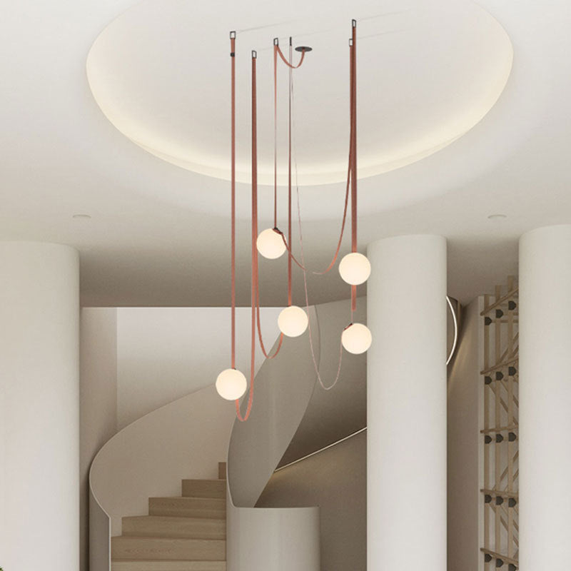 Dresden Collection | Floating Brass-Accented Brass & LED Chandelier - captured in a curated lifestyle vignette in a Mid-Century Modern living room setting.