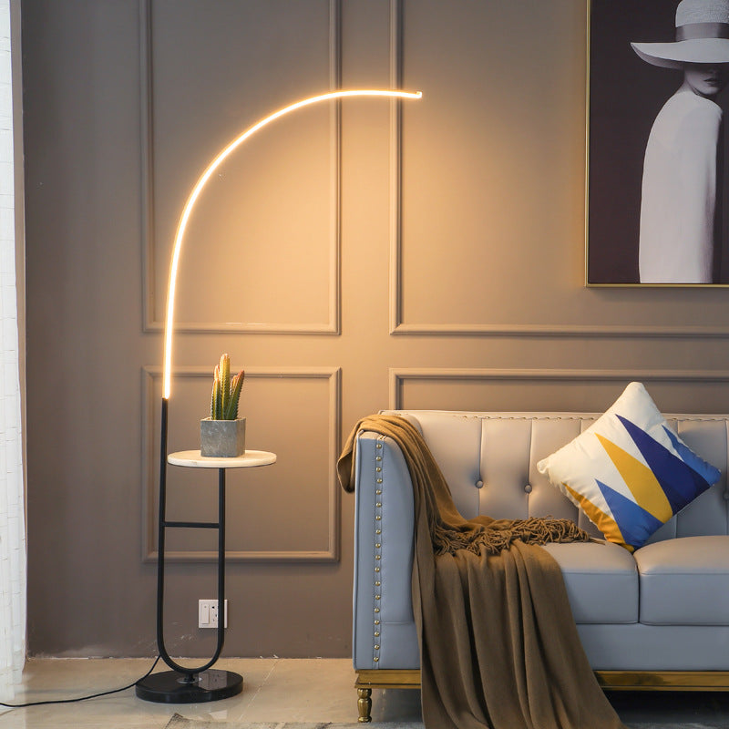 Ellington Collection | Sculptural Glass-Topped Walnut & Brass LED Bedside Lamp - captured in a curated lifestyle vignette in a Mid-Century Modern bedroom setting.