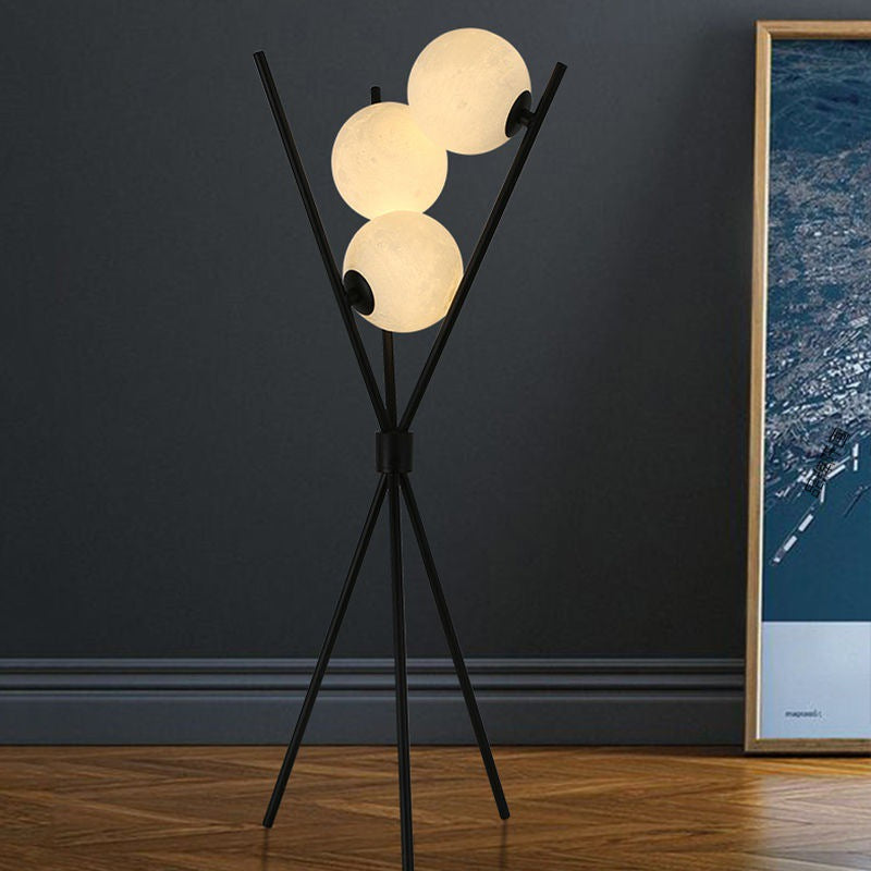 Ellington Collection | Geometric Atomic-Era Tri-Orb LED Floor Lamp - highlighting material texture and craftsmanship detail in a Mid-Century Modern living room setting.