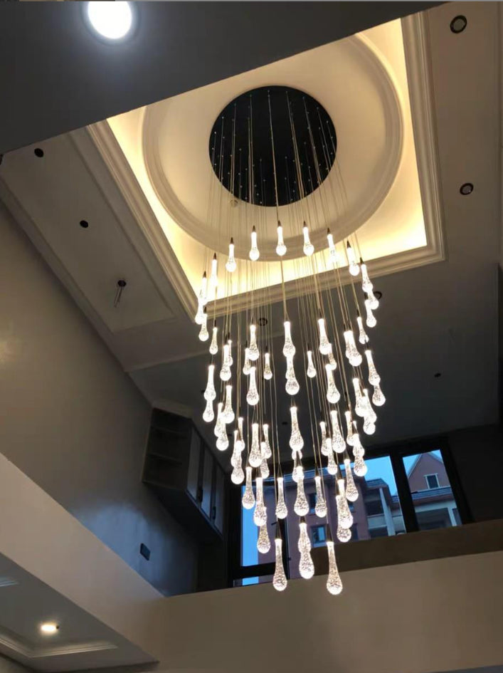 Astoria Collection | Geometric Glass-Topped Electroplated Glass Chandelier - presented at scale within a designed interior in a Mid-Century Modern living room setting.