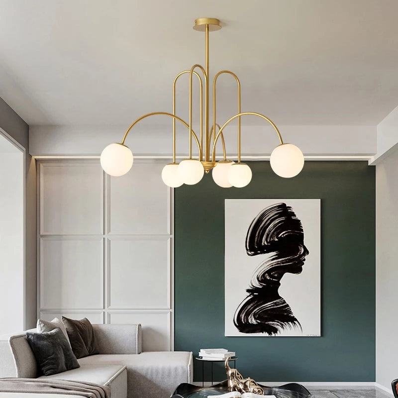Belmont Collection | Sculptural Brass-Accented Brass Pendant Lamp - showcasing full sculptural form and curated finish in a Mid-Century Modern living room setting.