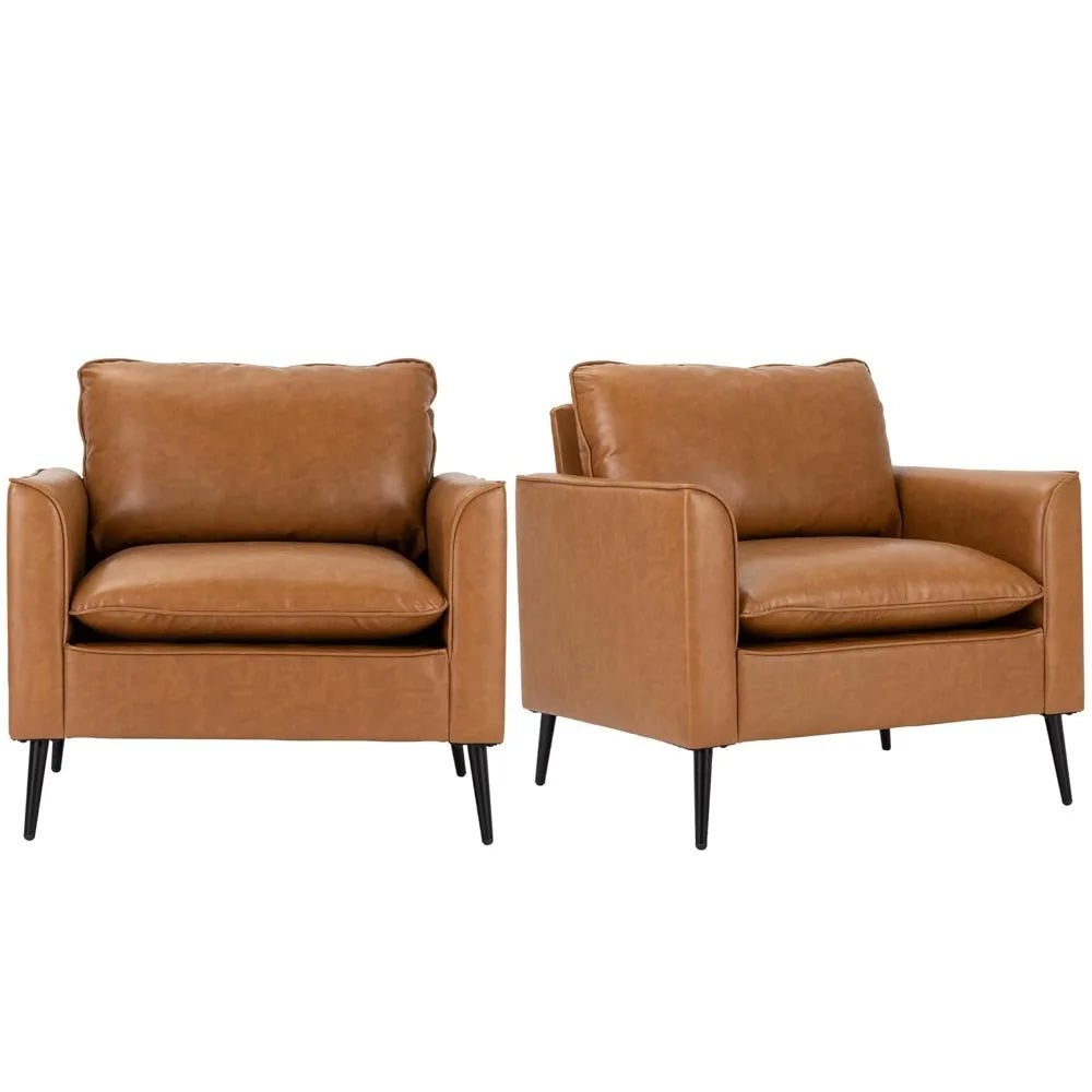 Ellington Collection | Arched Chrome-Detailed Cognac Leather Armchair Set - styled from an alternate angle revealing dimensional depth in a Mid-Century Modern living room setting.