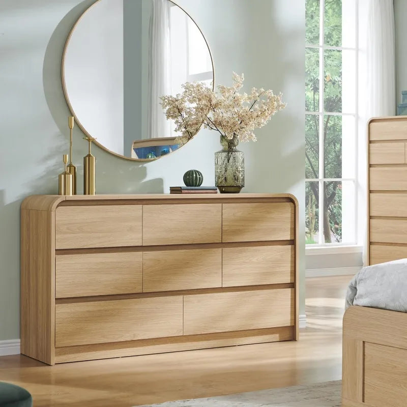 Dresden Collection | Sculptural Brass-Accented Walnut 8-Drawer Dresser - styled from an alternate angle revealing dimensional depth in a Mid-Century Modern bedroom setting.