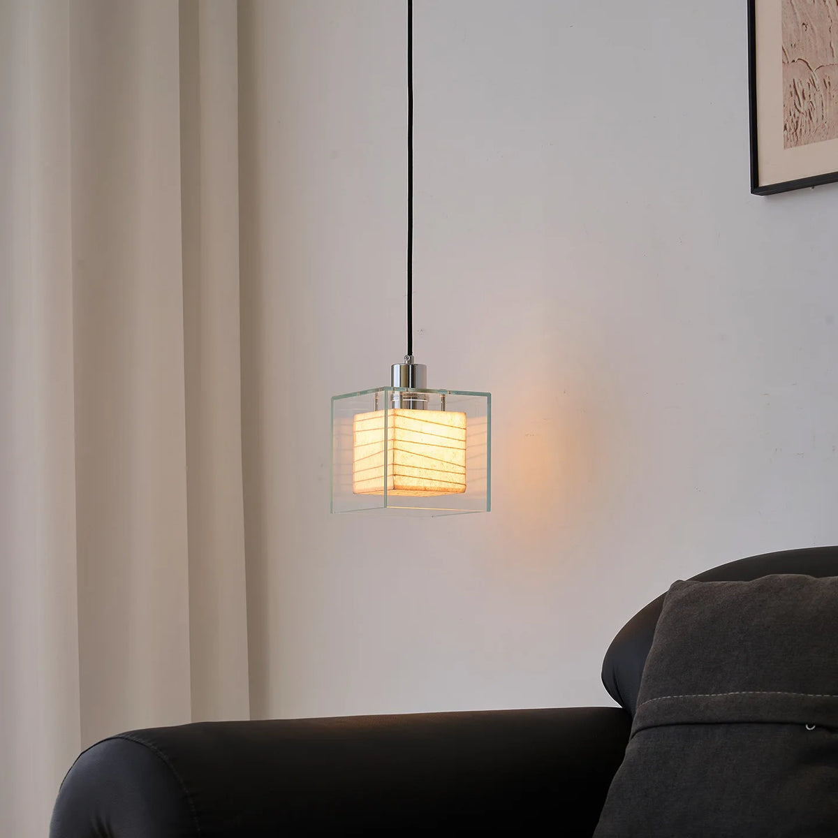 Ellington Collection | Geometric Atomic-Era Brass Pendant - captured in a curated lifestyle vignette in a Mid-Century Modern living room setting.