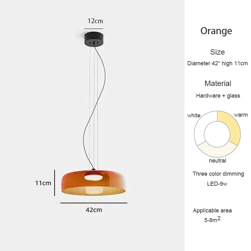 Belmont Collection | Geometric Glass-Topped Blown Glass Pendant - presented at scale within a designed interior in a Mid-Century Modern living room setting.