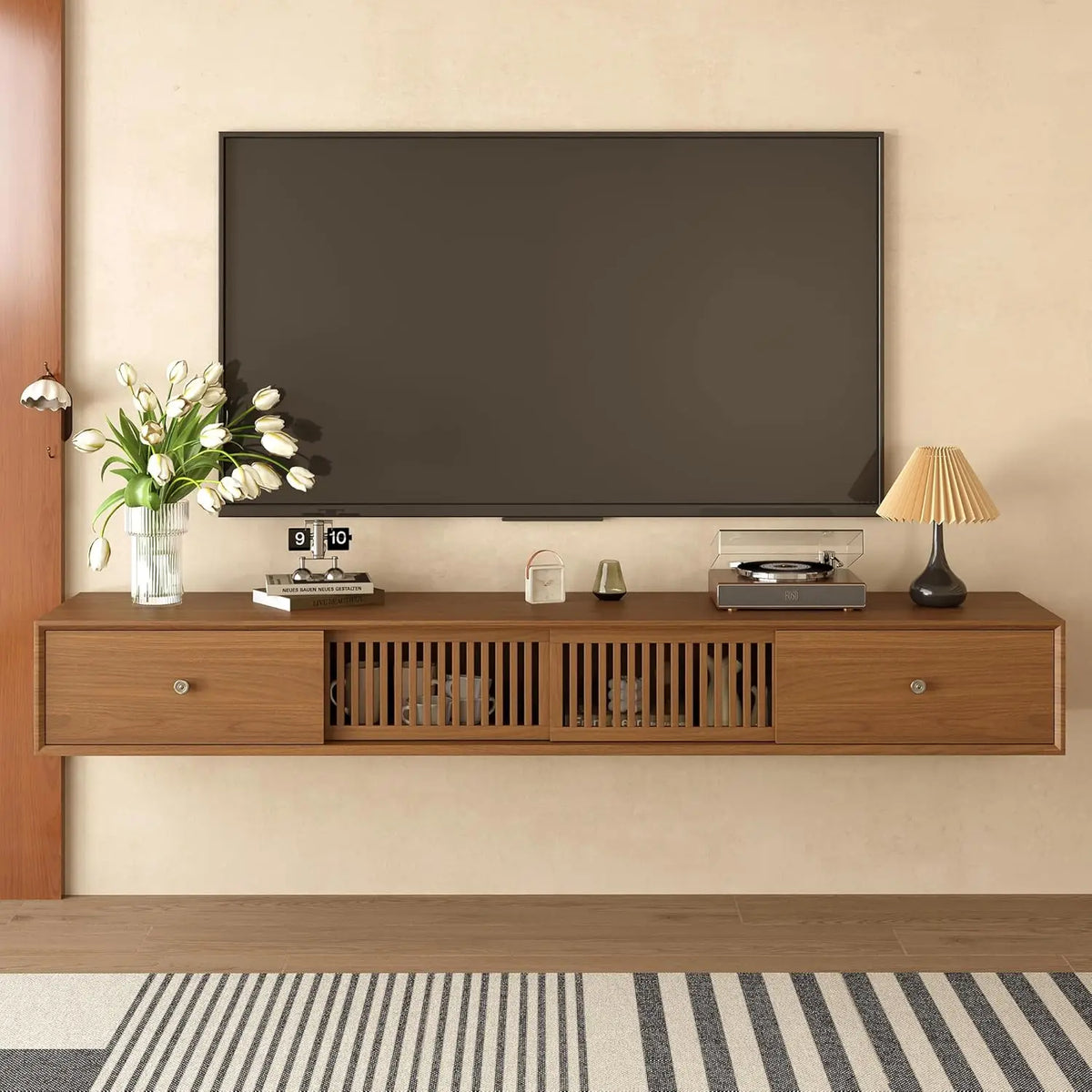 Ellington Collection | Slatted Nordic Floating Walnut Console - styled from an alternate angle revealing dimensional depth in a Mid-Century Modern entryway setting.