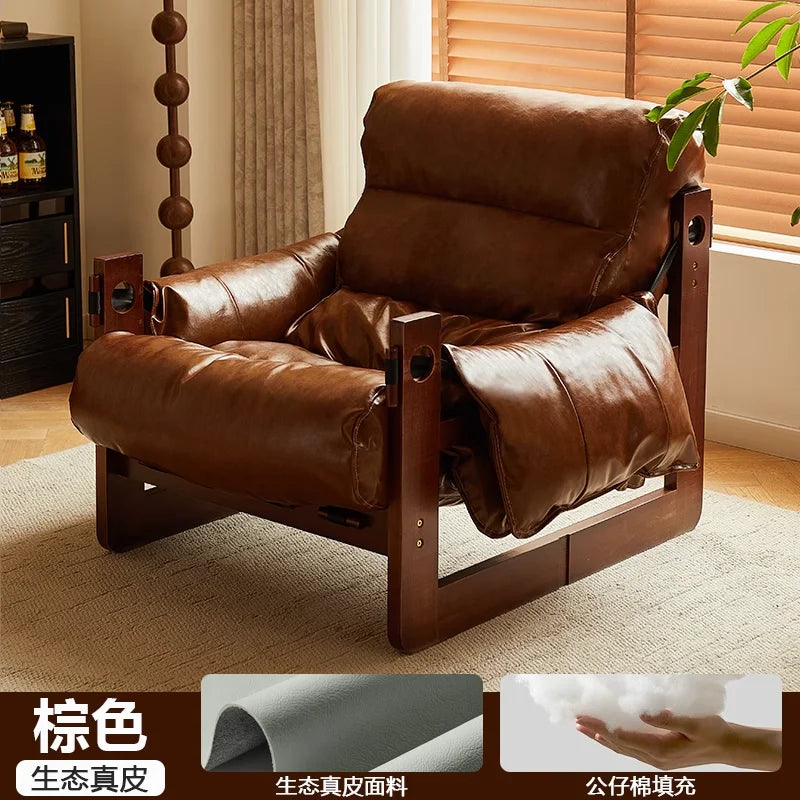 Ellington Collection | Glass-Topped Atomic-Era Cognac Leather Lounge - captured in a curated lifestyle vignette in a Mid-Century Modern living room setting.